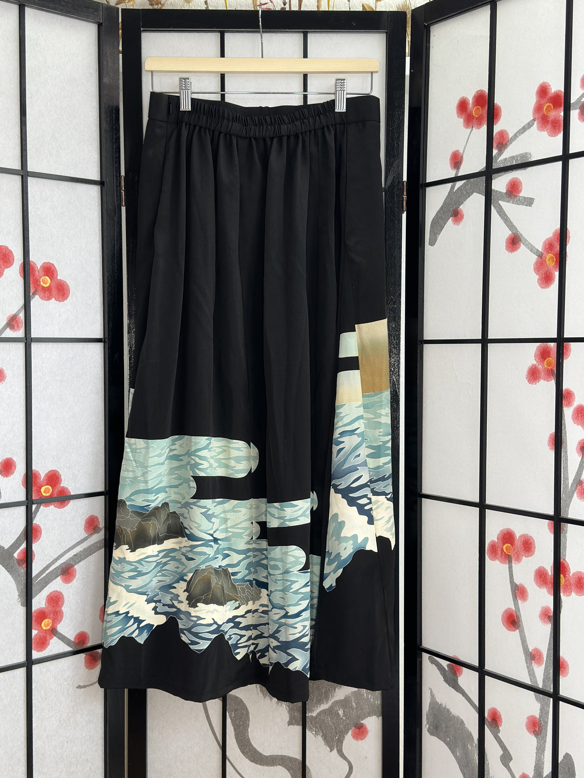 Black kimono skirt with elastic waistband and wave design, back view