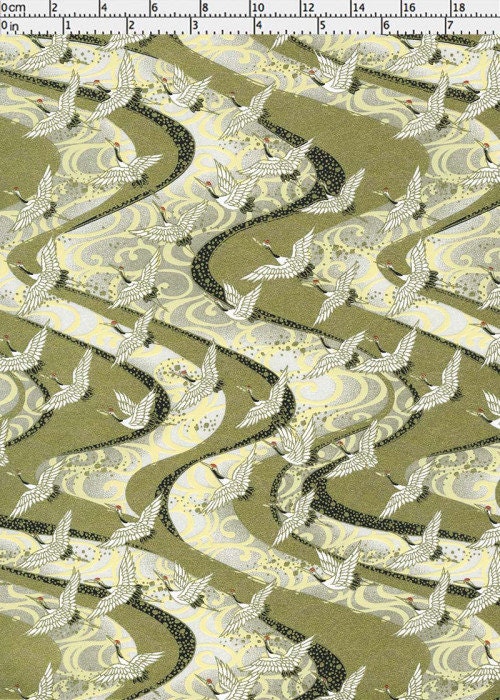Fabric with a pattern of birds and wavy lines on a green background