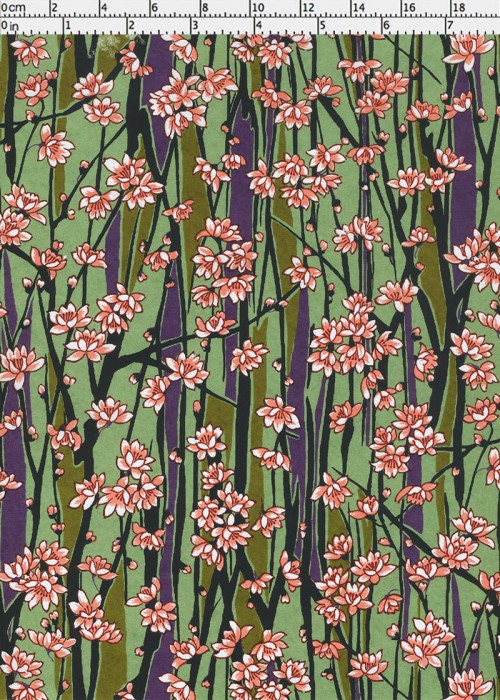 Floral pattern fabric with pink flowers on a green background