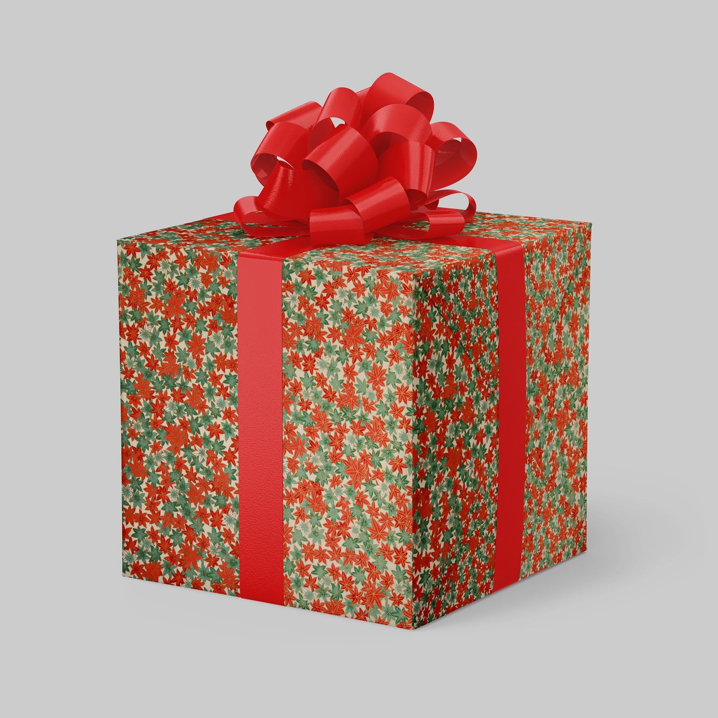 Gift box wrapped with chiyogami paper with red floral pattern and large red bow on a light gray background