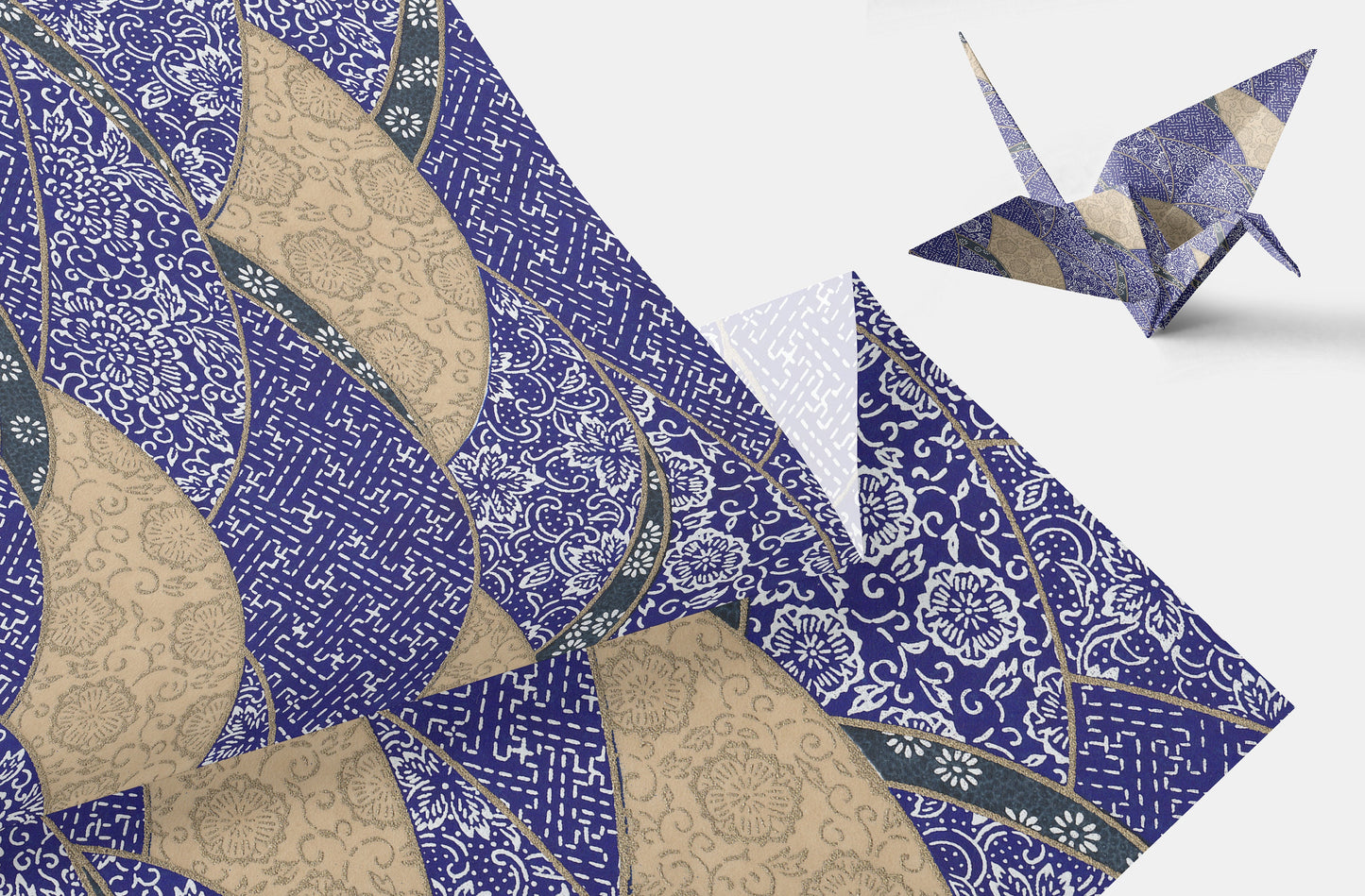 Decorative chiyogami paper with intricate patterns and a folded paper crane on a white background