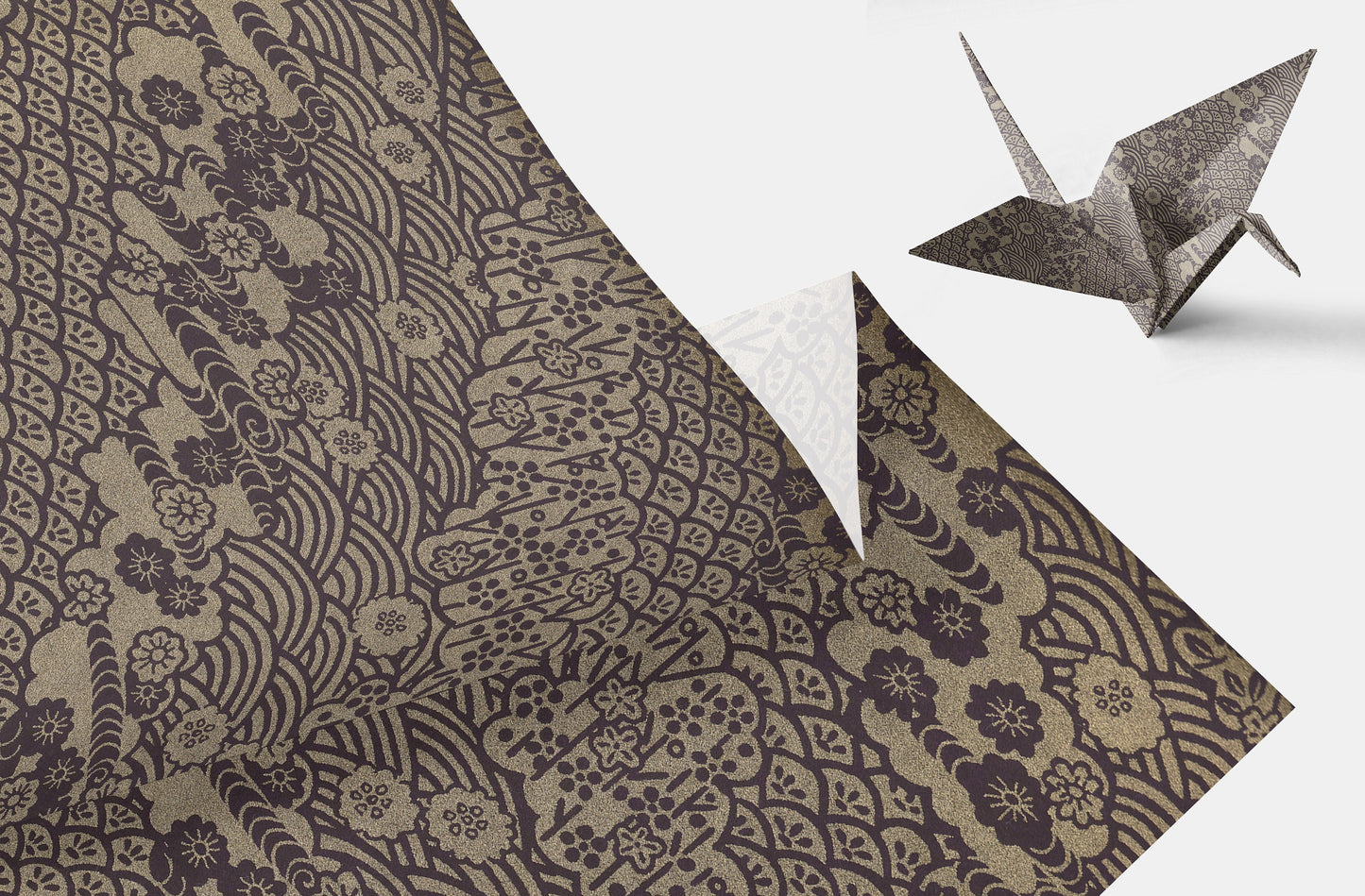 Patterned paper with a folded paper crane on a white background