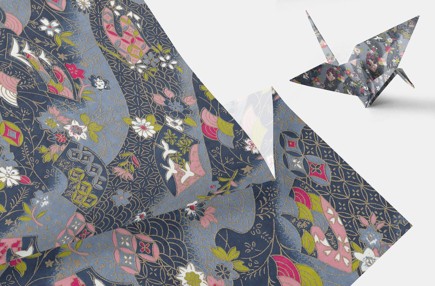 Floral-patterned paper cranes on a white background