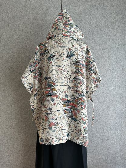 Decorative fabric with intricate patterns on a gray background