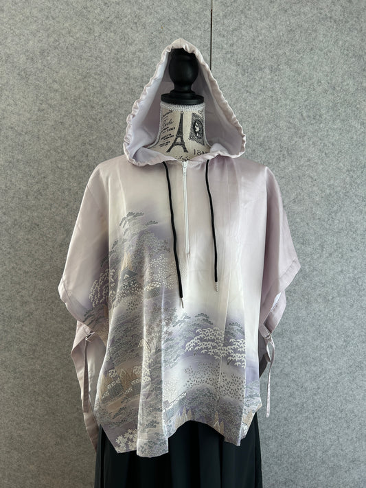 White raincoat with black accents on a gray background
