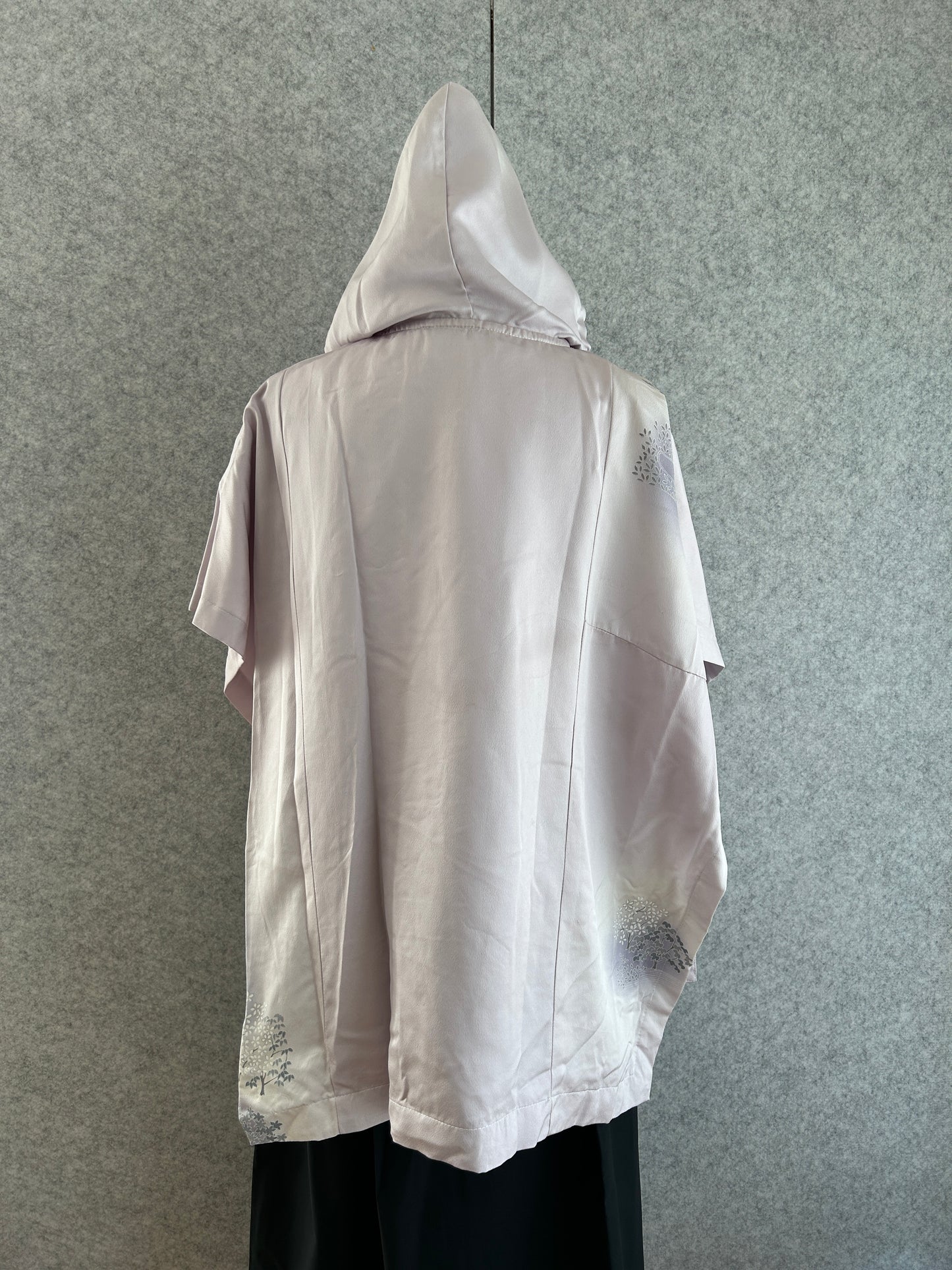 White plastic bag on a gray floor
