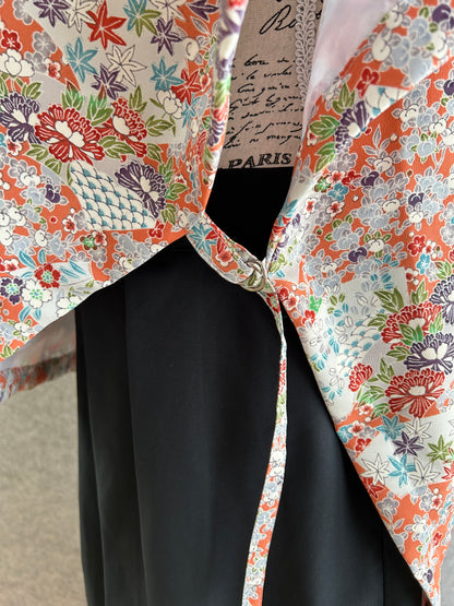 Floral fabric with colorful patterns on a black background