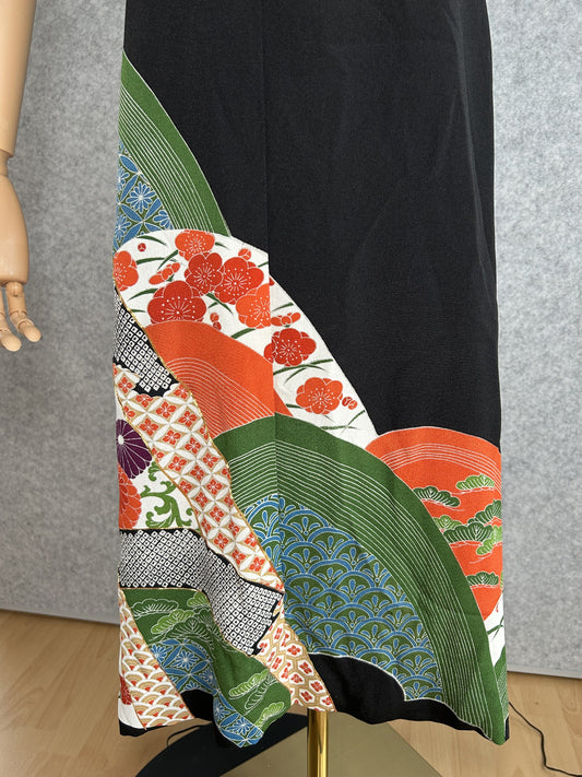 Black kimono dress skirt with red, green and blue fan-shaped motifs