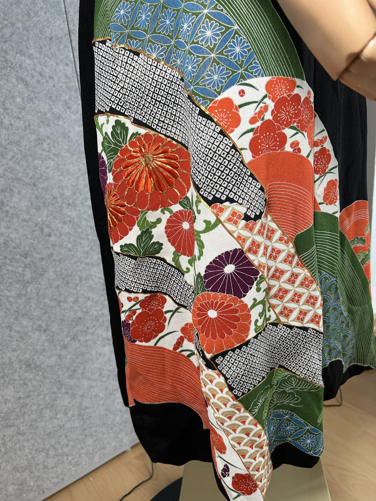 Kimono dress, detail of red chrysanthemums and geometric patterns on the skirt