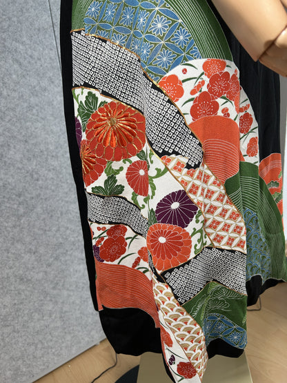 Kimono dress, detail of red chrysanthemums and geometric patterns on the skirt