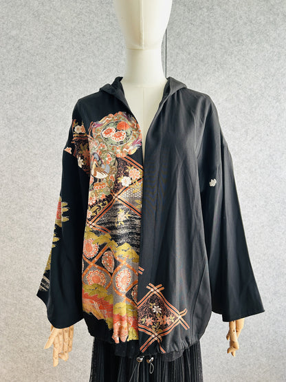 Black kimono hoodie with coral and gold floral medallion design, front view