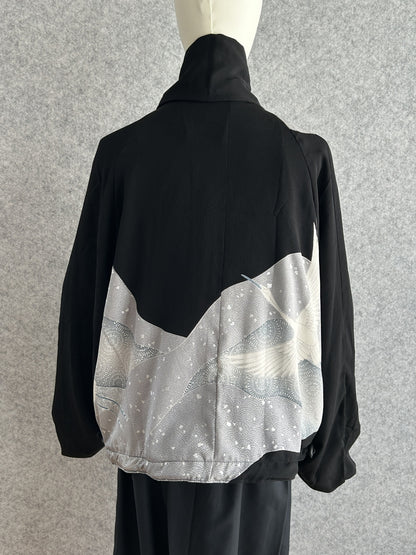 Black high collar kimono jacket with grey bird panel, back view