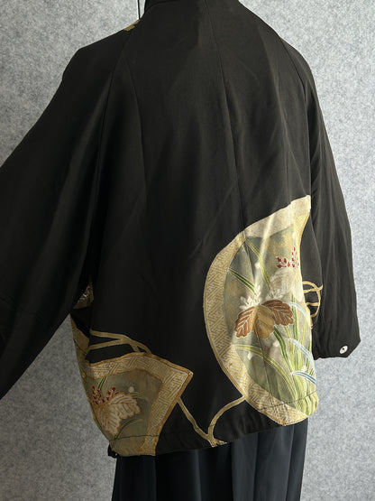 Black high collar kimono jacket, side back view of gold leaf panel