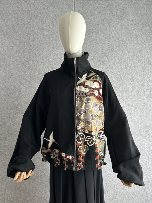 Black high collar kimono jacket with gold and red scenic panel, front view