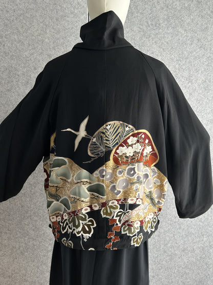 Black high collar kimono jacket with flying birds and fan design, back view