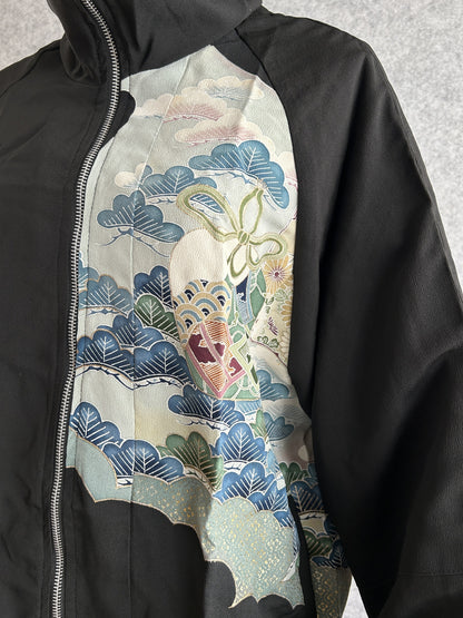 Black high collar kimono jacket, detail of blue trees and clouds on front