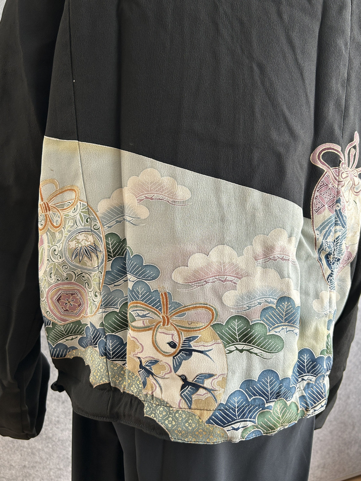 Black high collar kimono jacket, side back detail of trees and flying birds