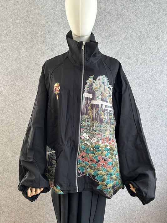 Black high collar kimono jacket with landscape scene, front view