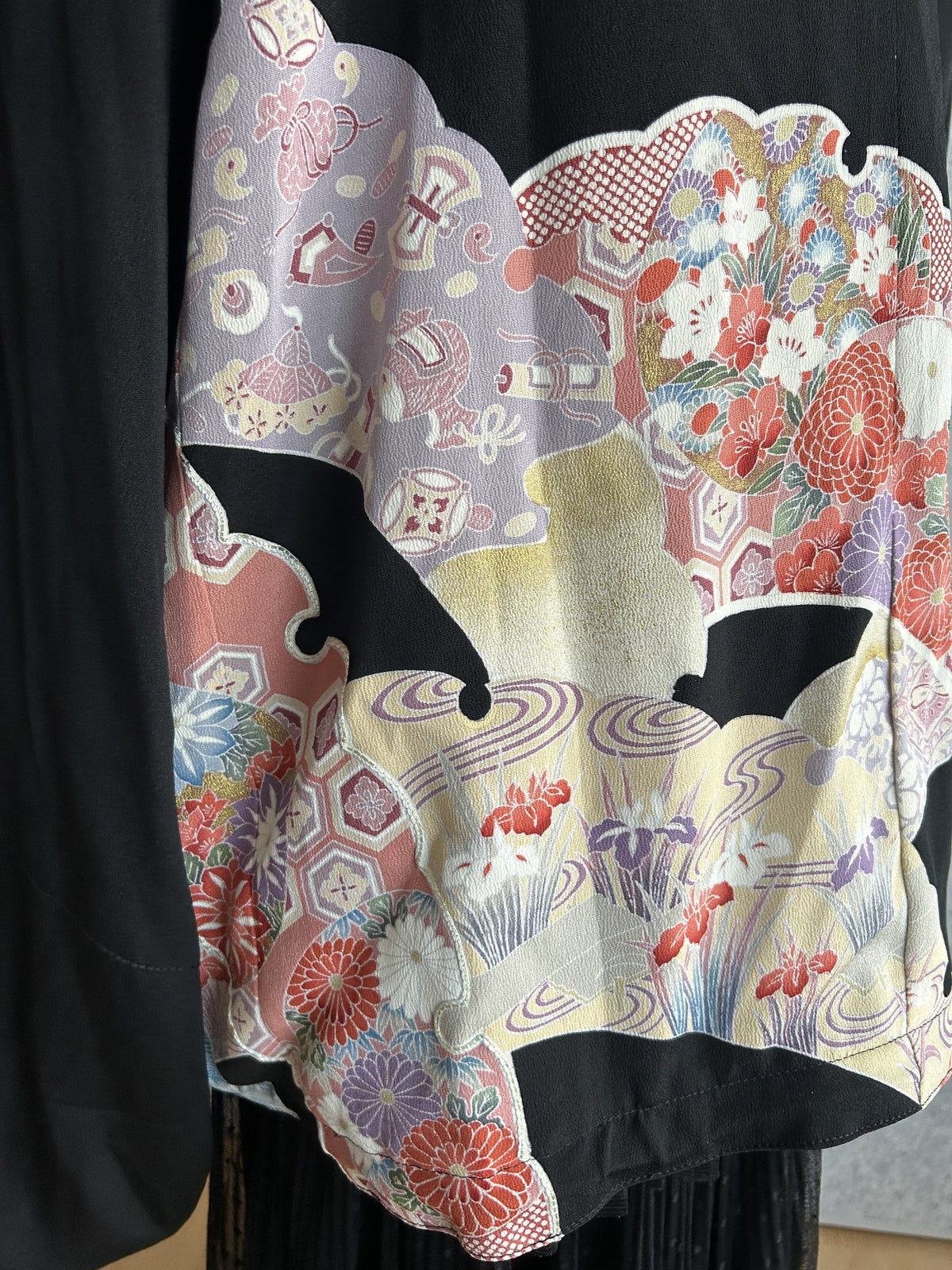 Black kimono jacket, detail of lilac and red floral panel on back