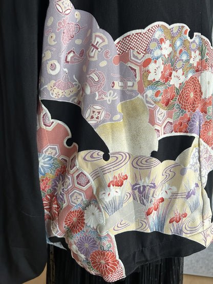 Black kimono jacket, detail of lilac and red floral panel on back