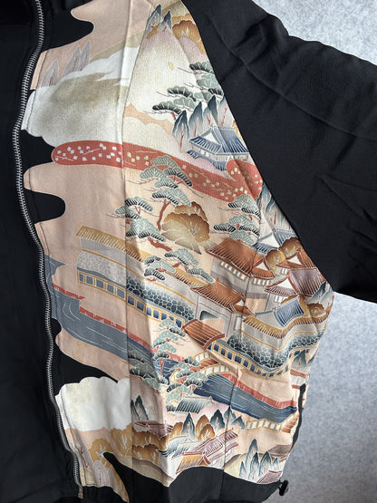 Black kimono jacket, close-up of front panel with trees and rooftops
