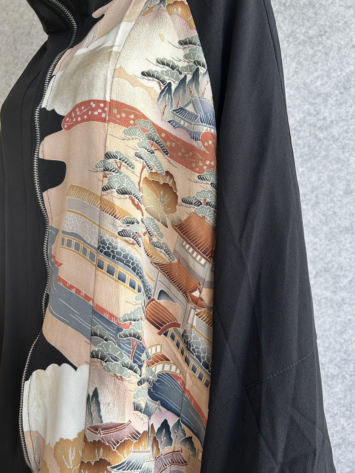 Black kimono jacket, detail of front landscape panel with pine trees
