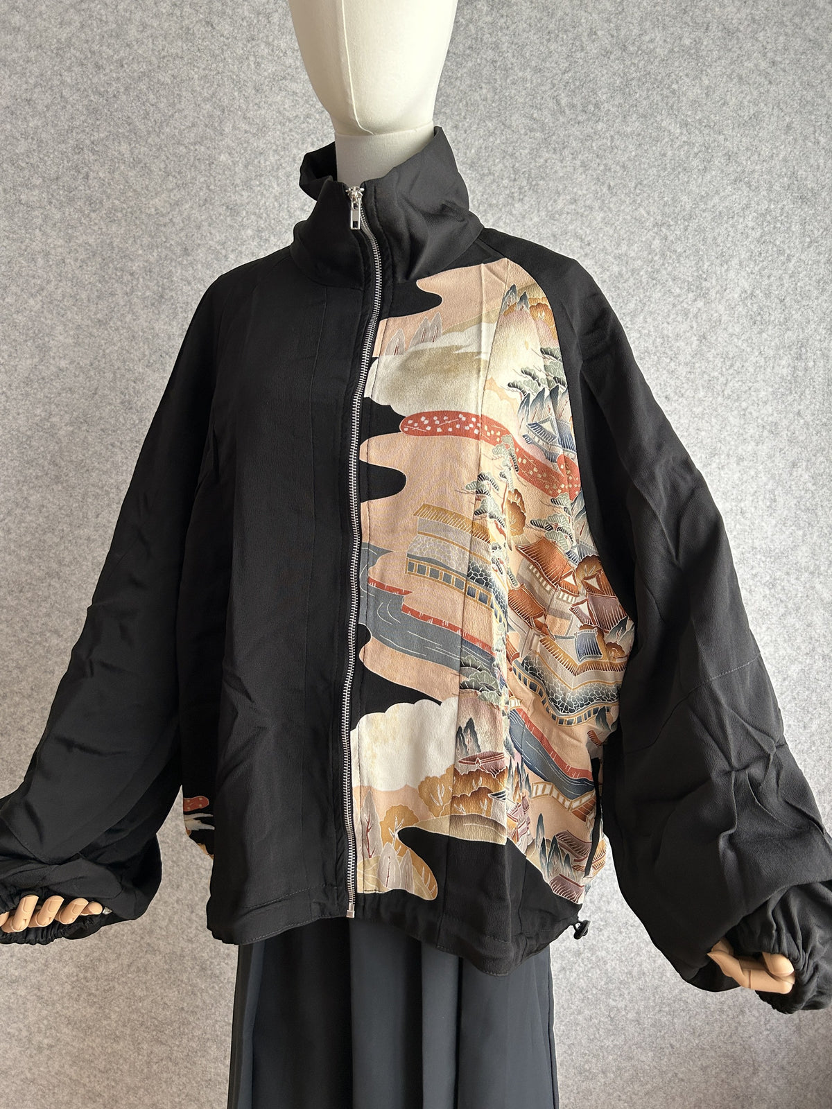 Black high collar kimono jacket with landscape panel, front view arms out