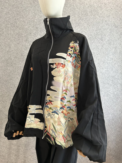 Black high collar kimono jacket with pastel landscape panel, front side view