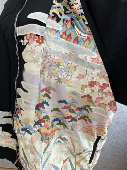 Black kimono jacket, close-up of pastel pine and maple leaf front panel