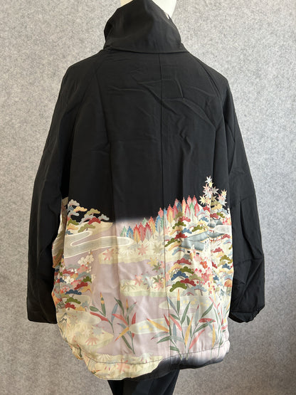 Black high collar kimono jacket with pastel landscape at hem, back view