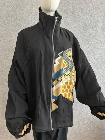 Black high collar kimono jacket with gold geometric panel, front view