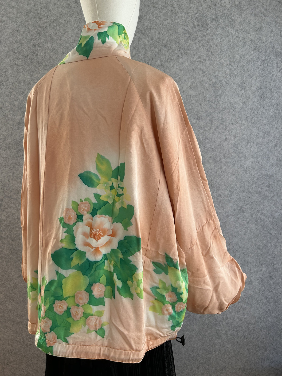 Peach kimono jacket with large flower motif on lower back, back view