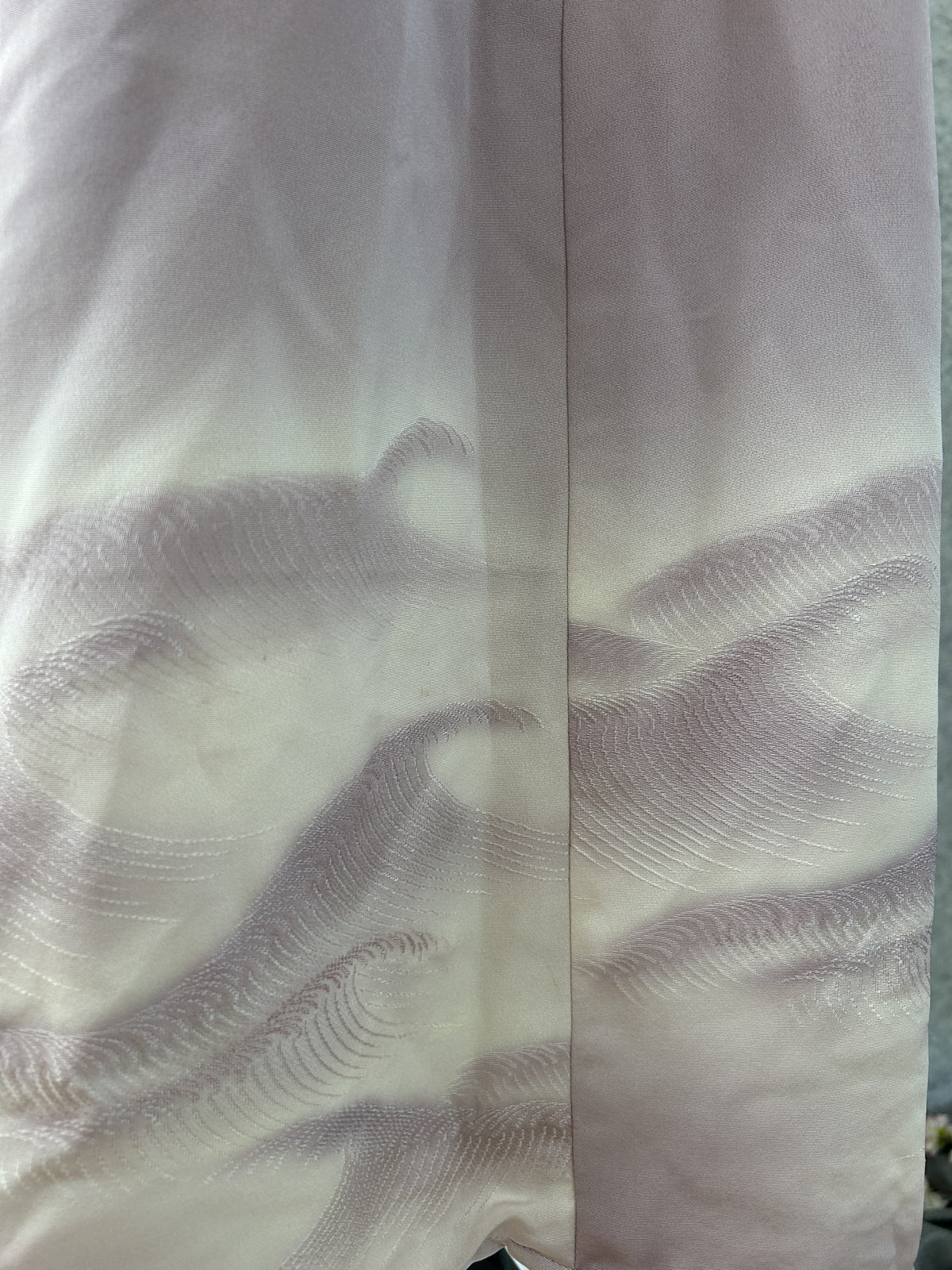Detail of stitched lilac and white waves on ivory kimono silk