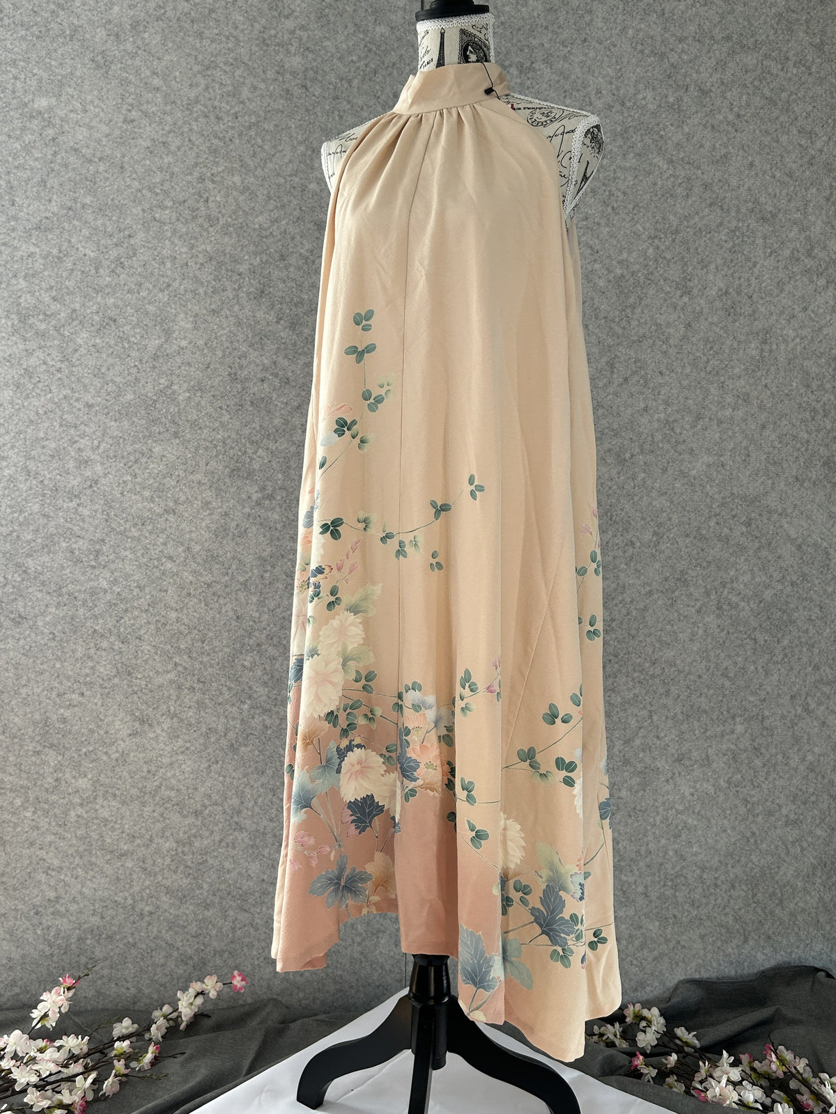 Peach kimono halter dress with painted chrysanthemums at the hem, front view