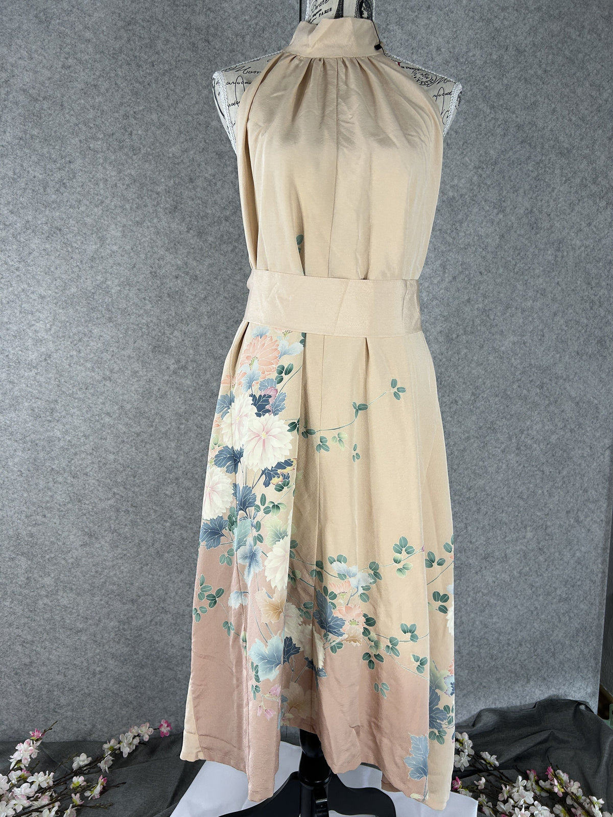 Peach kimono halter dress with matching fabric sash at the waist, front view