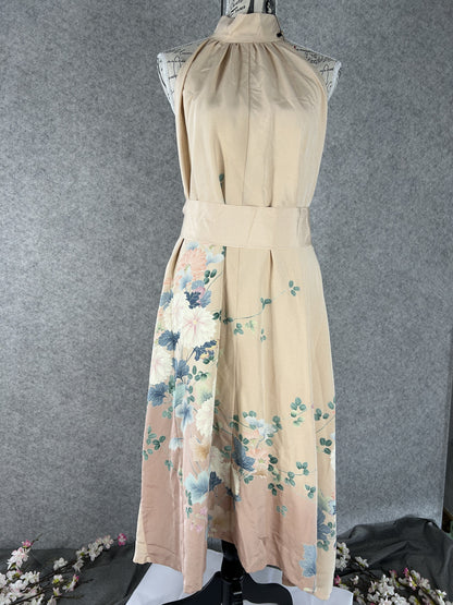 Peach kimono halter dress with matching fabric sash at the waist, front view