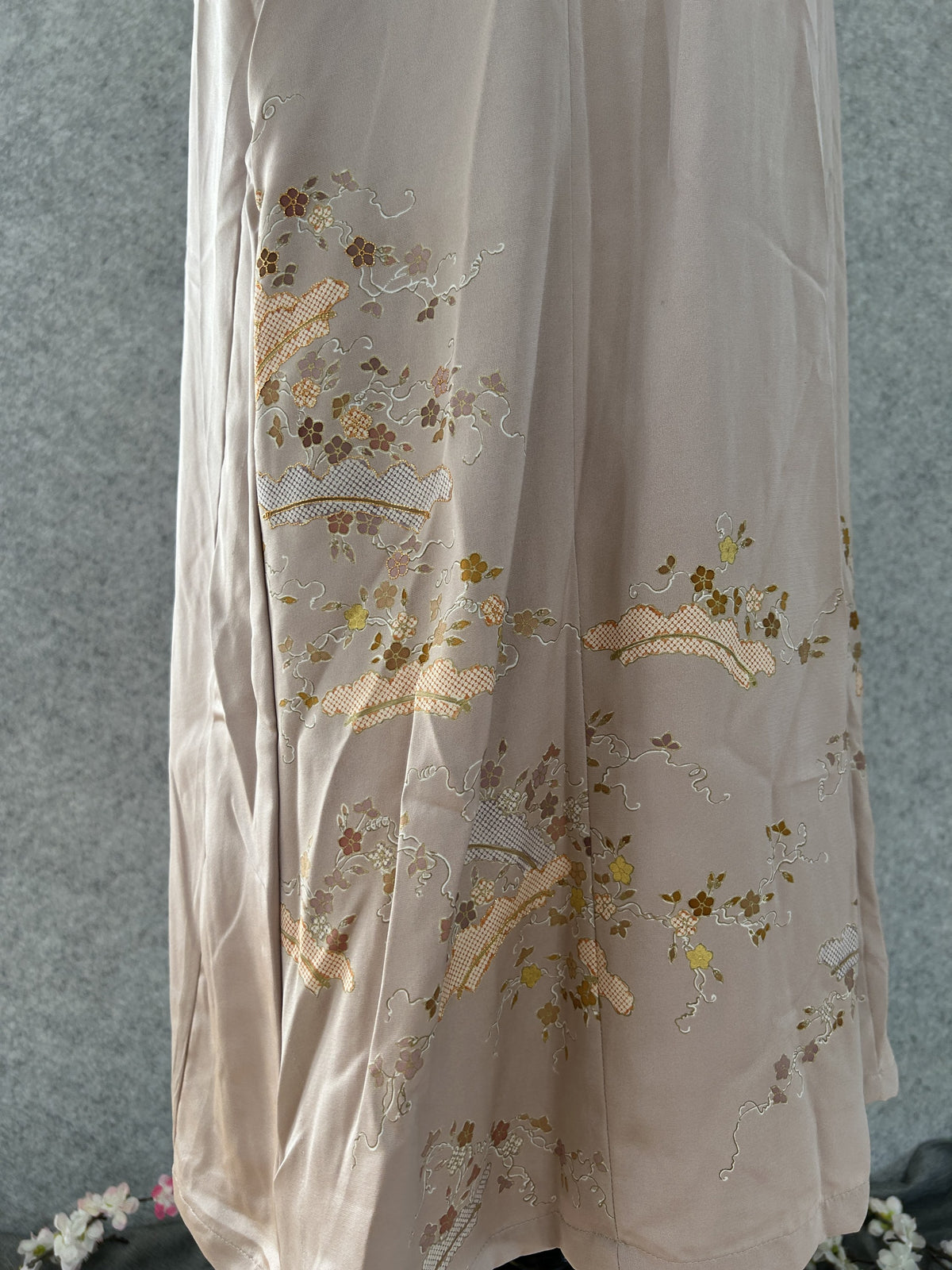 Lower skirt of beige kimono dress with embroidered flower sprays
