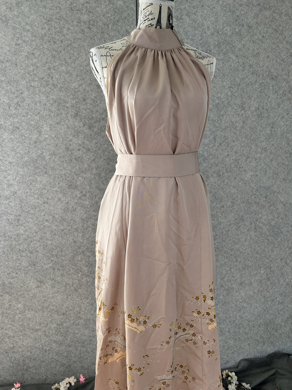 Beige kimono halter dress belted with matching sash, front view
