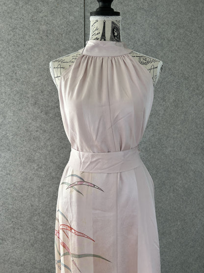 Light pink kimono halter dress with matching sash belt, front close-up