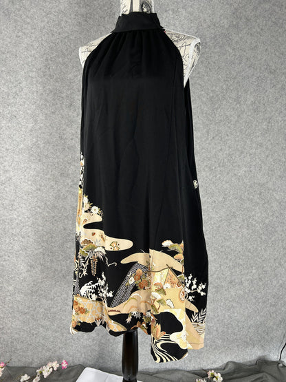 Black kimono halter dress with gold and cream scenic hem, front view