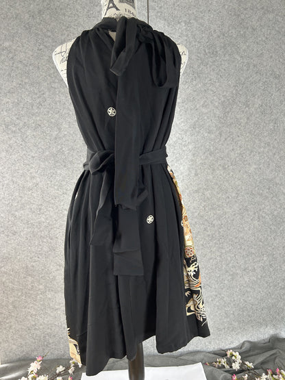 Back of black kimono halter dress with white crest and long neck ties