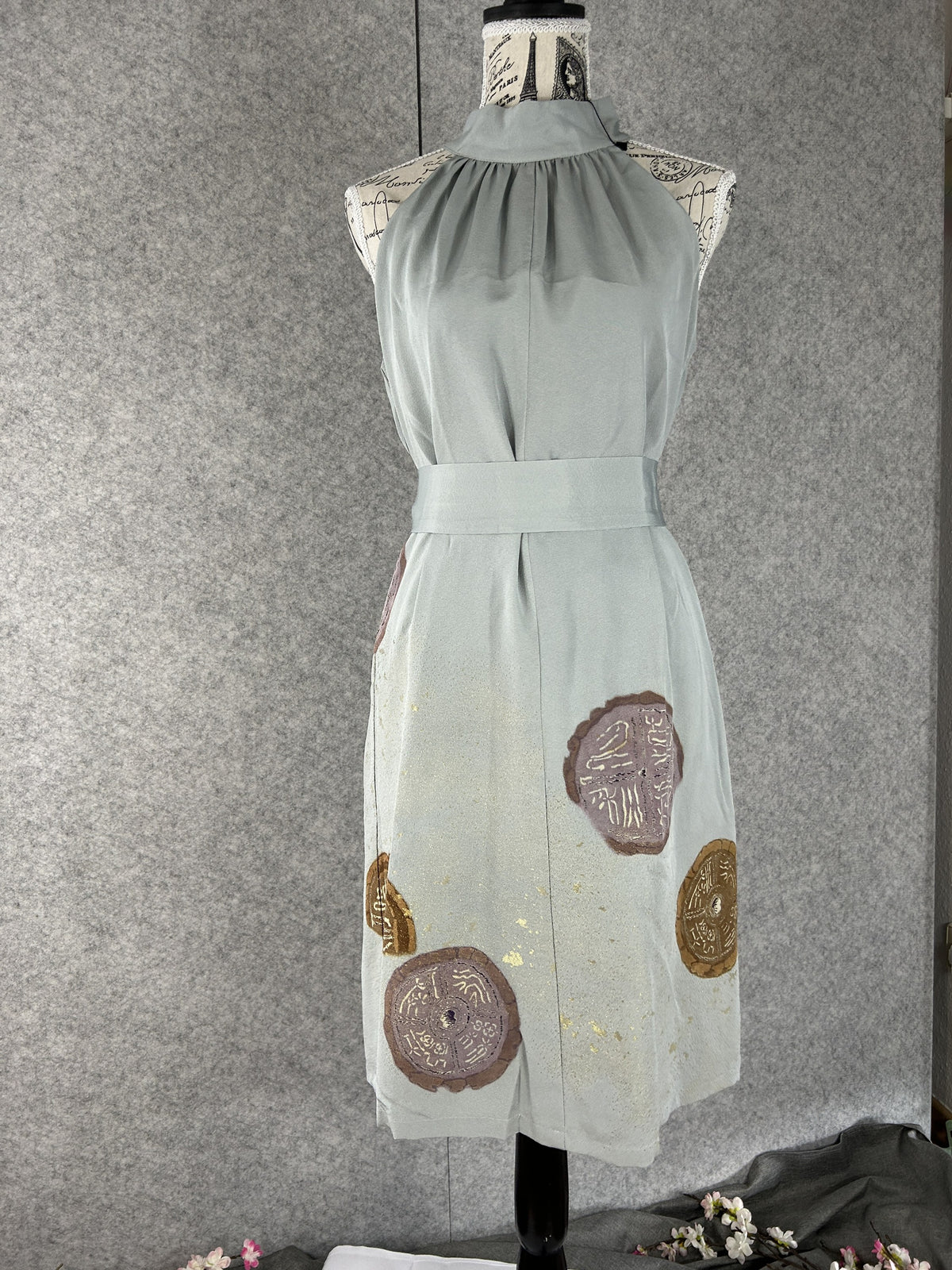 Sage green kimono halter dress with matching sash at the waist, front view