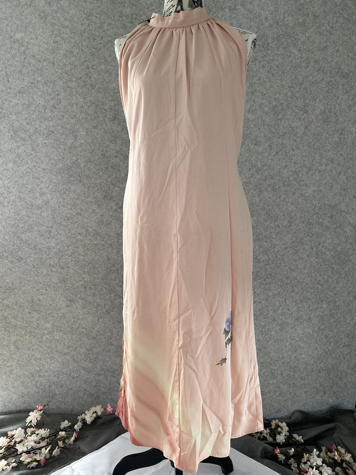 Pink kimono halter dress with painted blue camellia near the hem, front view