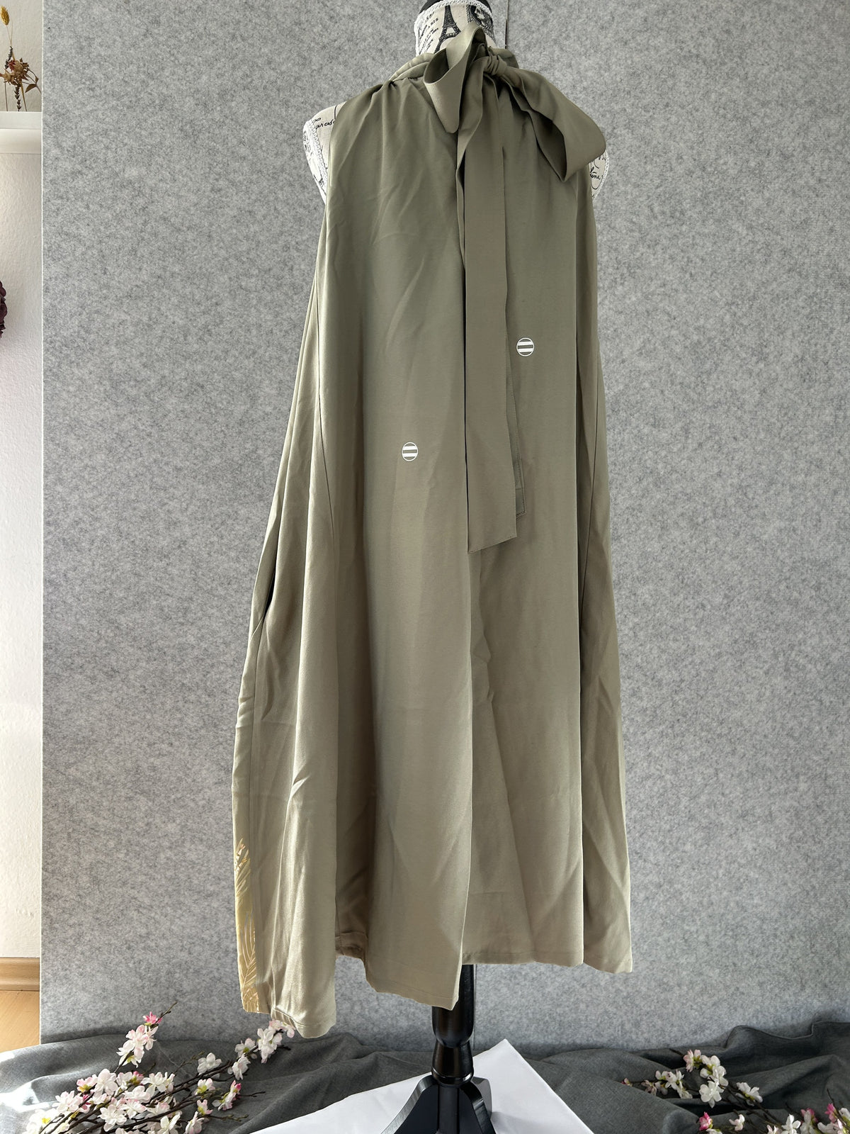 Sage green kimono halter dress with neck tie bow, back view