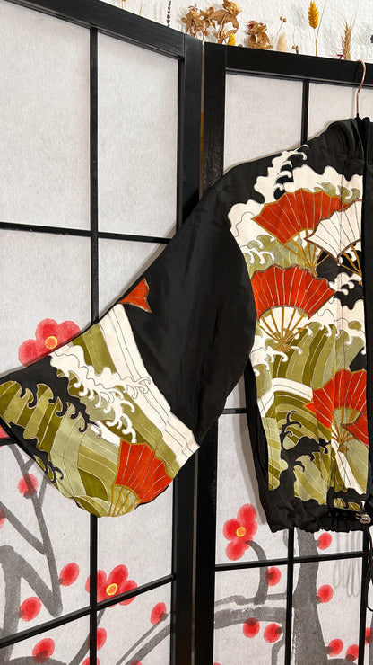 Upcycled kimono cropped hoodie HK1828, black silk with red folding fans and waves, sleeve view