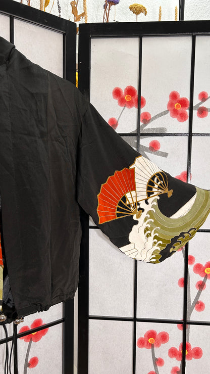Upcycled kimono cropped hoodie HK1828, black silk with red folding fans and waves, sleeve view