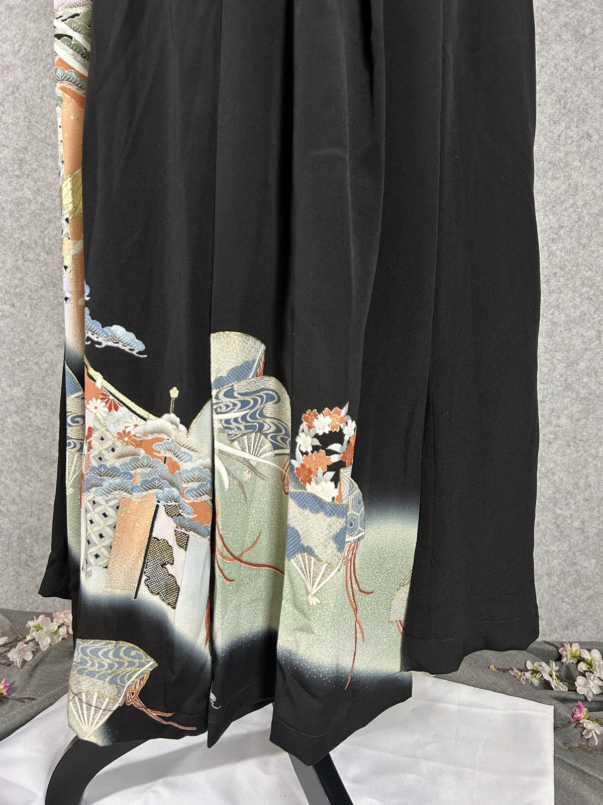 Black upcycled tomesode kimono hakama pants with a gold phoenix and fans, back view