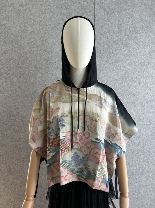 Black and cream hooded kimono poncho with landscape scene, front view