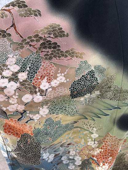 Black hooded kimono poncho, detail of pine tree and white blossoms