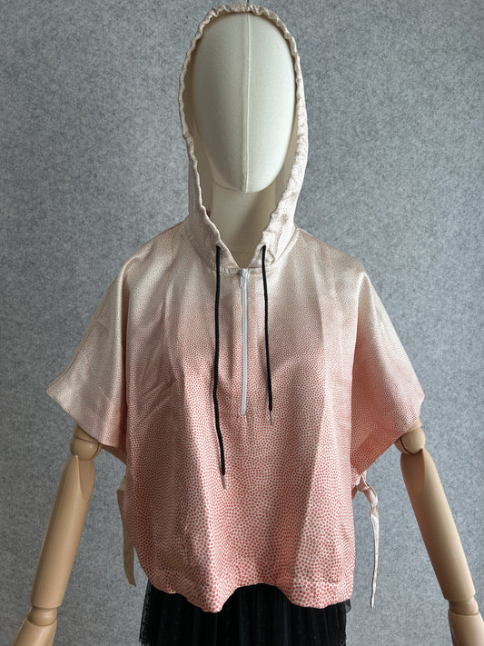 Light pink hooded kimono poncho with tiny coral dots, front view